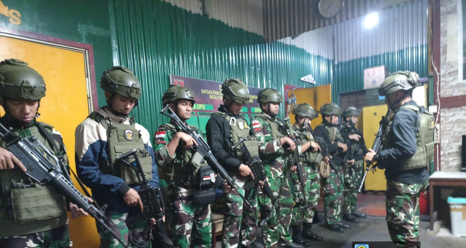 Tingkatkan Keamanan, Satgas Yonif 611/Awang Long Laksanakan Pengamanan dan Pengawalan Bus  Warga Desa Banti